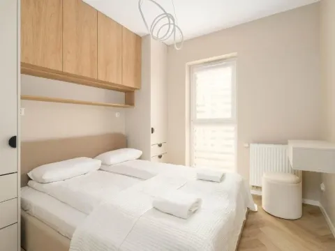 Beige Apartment in Poznań with Parking and Air Conditioned Living Room by Noclegi Renters, photo 2 of 10