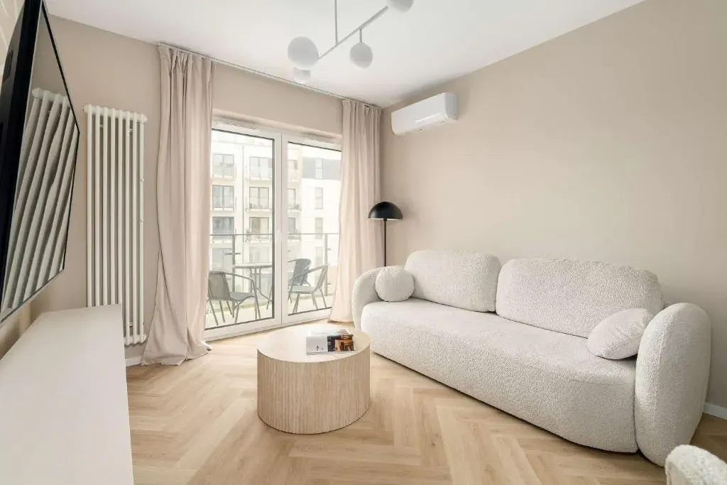 Beige Apartment in Poznań with Parking and Air Conditioned Living Room by Noclegi Renters, photo 1 of 10