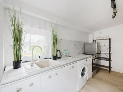 Grunwald Raszyńska Bright Apartment by BookingHost, photo 3 of 10