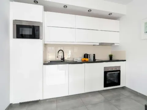Modern Family Apartment with Parking and Balcony in the City Center by Noclegi Renters, photo 3 of 10