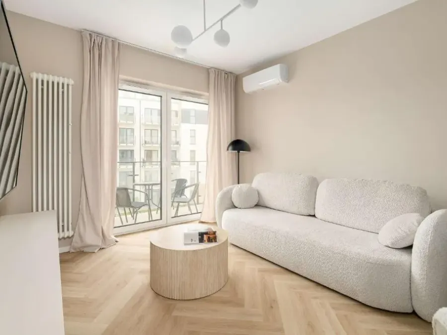 Beige Apartment in Poznań with Parking and Air Conditioned Living Room by Noclegi Renters, photo 1 of 10