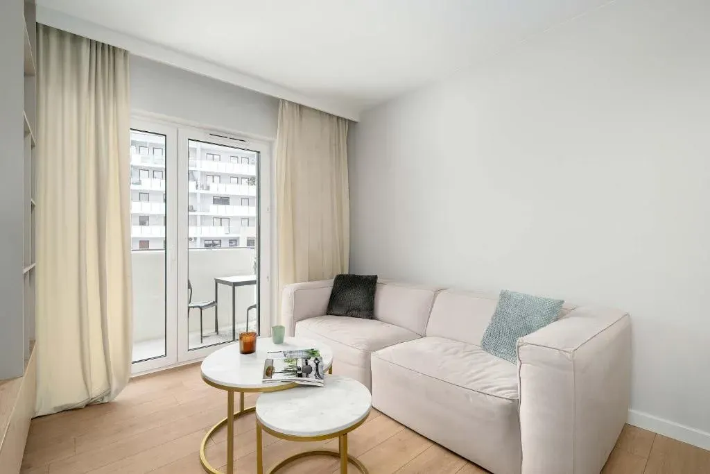 Beige and Green Two Bedroom Apartment in Poznań with Parking and Bathtub by Noclegi Renters, photo 1 of 10