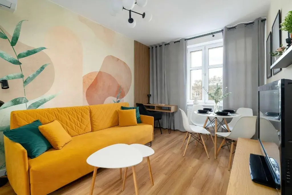 Yellow Apartment in Poznań with Air Conditioning and Desk for Remote Work by Noclegi Renters, photo 1 of 10